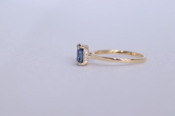 unique hidden halo blue sapphire ring
